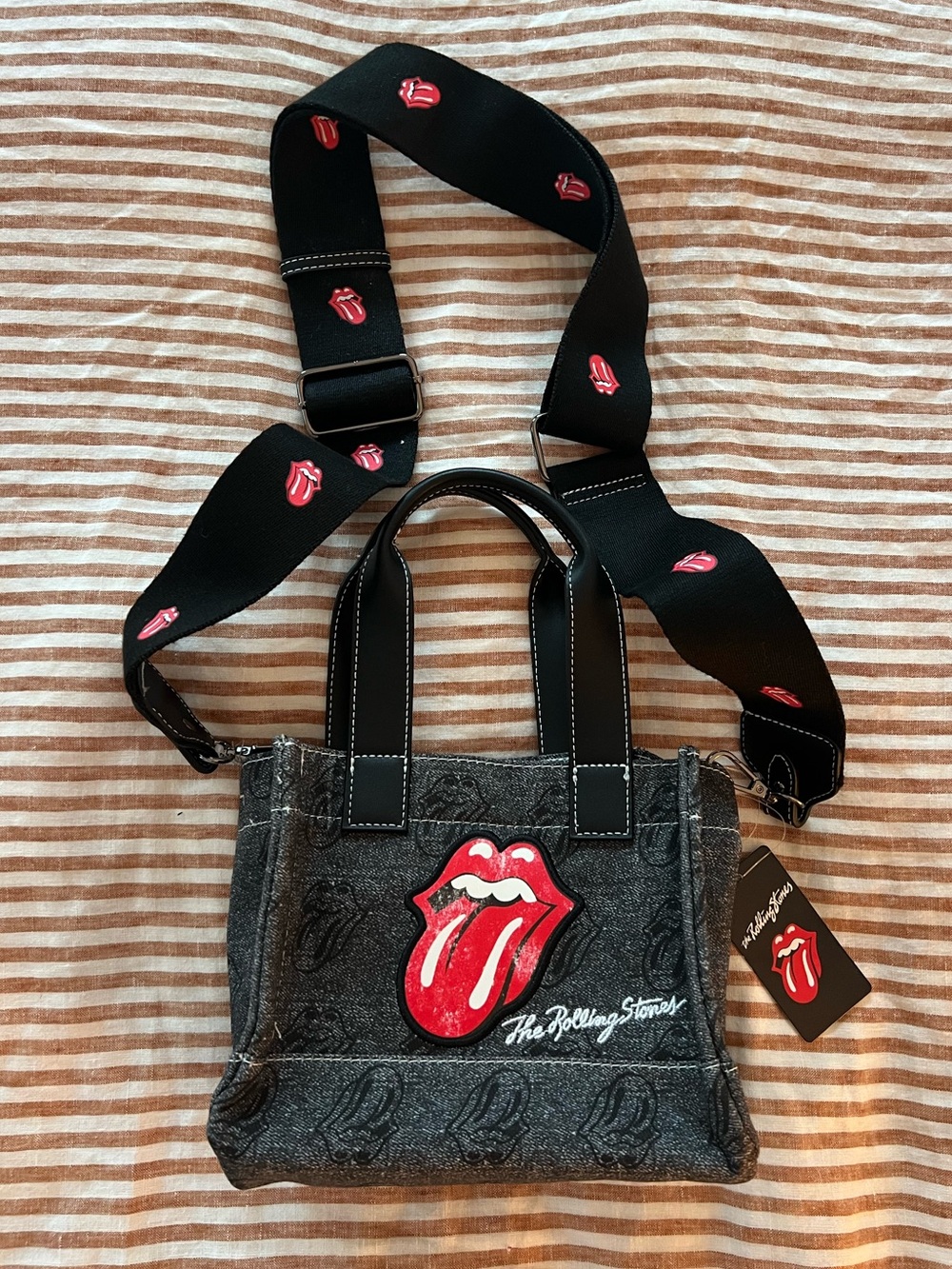 the Rolling Stones Black and Red Tongue Logo Crossbody Bag